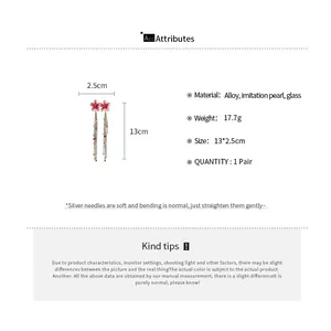 Detailed infographic of pink floral tassel earrings with size and material specifications