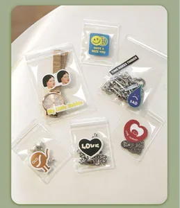 Close-up of transparent anti-oxidation jewelry storage bags with decorative graphic cards