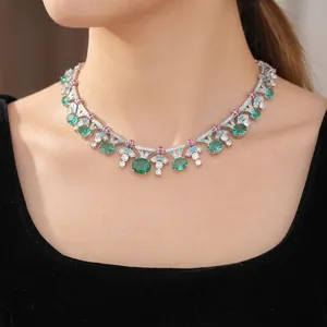 Vintage palace style necklace with emerald green oval zircon and teal enamel details