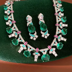 Elegant palace style zircon necklace and earrings set with vibrant green gemstones