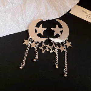 Elegant silver crescent moon and star earrings featuring dangling chain tassels details