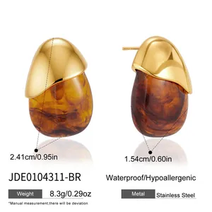 Detail of amber resin teardrop earrings in gold-tone stainless steel with measurements.
