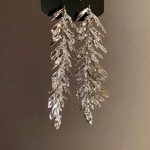 Elegant silver-tone leaf tassel drop earrings with intricate feather-like details