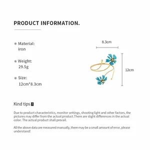 Detailed product information for the gold metal arm cuff with blue flowers and size