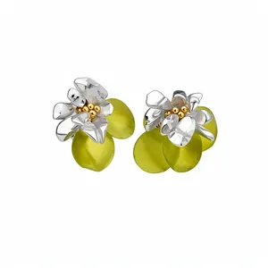 Elegant silver flower stud earrings with translucent green shell accents for summer