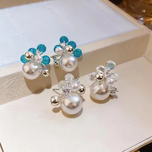 Detailed view of elegant French style zircon pearl stud earrings featuring delicate flower petals