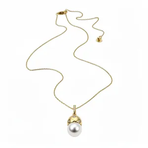 Elegant 14k gold plated necklace with a round pearl pendant and sparkling zirconia.