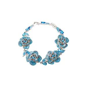 Vintage silver flower bracelet with sparkling blue zircons and pear-cut accent stones