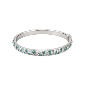 Elegant silver-tone bangle bracelet with mint green and white cubic zirconia stones
