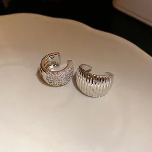 Silver non-pierced ear cuffs with cubic zirconia pavé and textured ribbed design