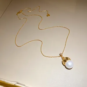 Elegant 14k gold plated necklace with pearl pendant and sparkling zircon accents