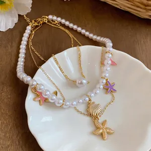 Summer beach style layered necklace with elegant shell and starfish charms and pearls