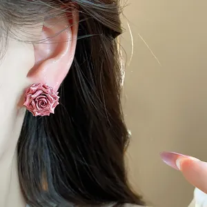 Elegant French style pink resin rose flower earring stud shown as a detailed close-up