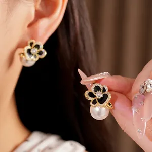 Elegant 14k gold plated flower stud earrings with sparkling zircon and white pearl