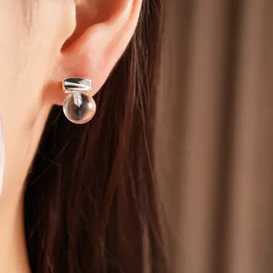 Elegant minimalist clear resin ball stud earrings with silver pins for daily wear