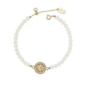 Bracciale da donna in perle e zirconi placcato oro 18K con ciondolo stella bussola