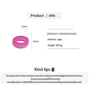 Detail view of pink resin geometric bangle with 8.2cm dimensions and 69.5g weight