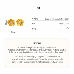 Detail view of yellow zircon flower earrings with 2.5cm size and material specifications