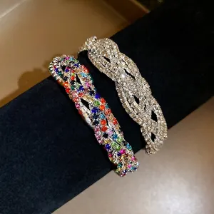 Fashionable crystal encrusted multi-layer twisted bracelet with elegant retro design.
