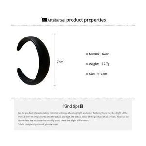 Close-up of the black resin oval open bracelet showing size 6x7cm and weight 12.7g.