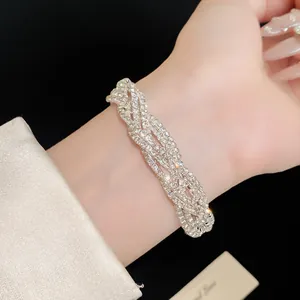 Close-up of elegant multi-layer rhinestone bracelet on wrist for a luxury aesthetic
