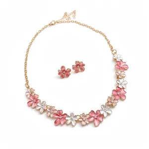 Elegant floral jewelry set with pink and white enamel flowers and zircon crystals.