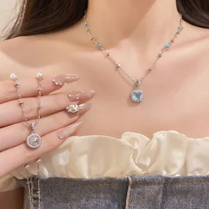 Elegant pearl beaded necklace with zircon round and square blue stone pendants