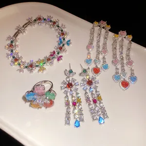 Detailed view of luxury multi-colored zircon jewelry set with flower and heart designs