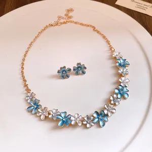 Elegant zircon flower necklace and stud earring set in blue and white for vacation style