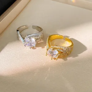 Exquisite zircon twisted open ring in gold and silver finish with elegant sparkle