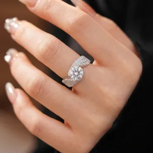 Elegant twisted open ring with a brilliant round cubic zirconia stone for women