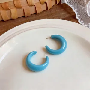 Sky blue C-shaped resin hoop earrings with silver needles in sweet dopamine candy colors