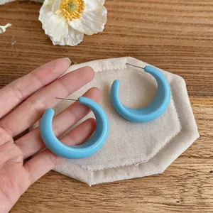 Light blue dopamine resin C-shaped hoop earrings for women with minimalist silver needle design