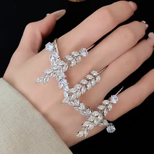 Macro view of an elegant marquise zircon wheat ear leaf multi-finger ring jewelry