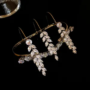 Macro view of exquisite zircon wheat spike details on a gold-plated luxury fashion ring.