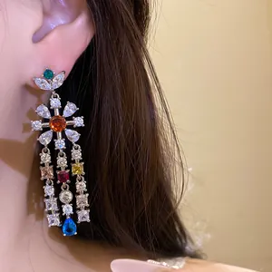 Detailed close-up view of colorful flower tassel drop earrings with sparkling zircons