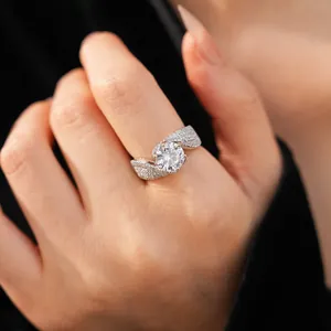 Detailed view of twisted silver ring featuring a large round zircon center stone