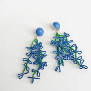 Elegant blue and green beaded flower drop earrings designed for a stylish beach vacation