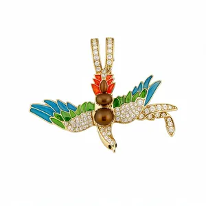 Exquisite vintage bird brooch with colorful enamel and sparkling crystals in gold tone