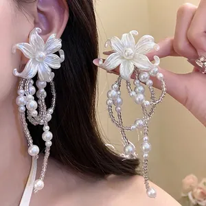 Elegant flower tassel earrings with pearls and silver needles for a romantic style