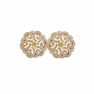 Elegant gold-plated openwork flower stud earrings featuring sparkling cubic zirconia stones