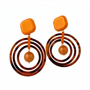 Stylish retro Maillard style brown and orange resin drop earrings with concentric rings