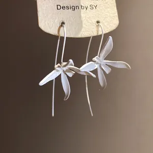Elegant white spray-painted metal flower ear hook earrings with minimalist design