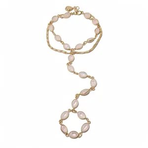 Vintage gold-tone hand harness with double-layer chain and oval pink resin stones