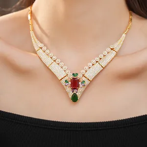 Detailed view of vintage 18k gold plated necklace with red square gemstone and pavé zirconia