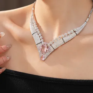 Close-up detail of luxury vintage pink square flower necklace with CZ diamonds on neck