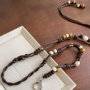 Catenina in vita bohémien intrecciata a mano marrone con perle colorate per abiti etnici