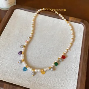 Elegant pearl necklace with colorful glass charms and dainty gold accents for women (90)