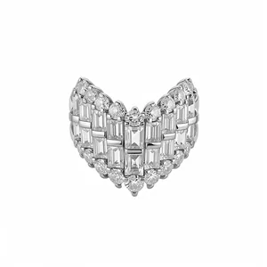 Luxurious silver V-shaped ring paved with baguette and round sparkling cubic zirconia