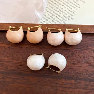 Korean style gold-plated bean hoop earrings in beige, pink, and white marble